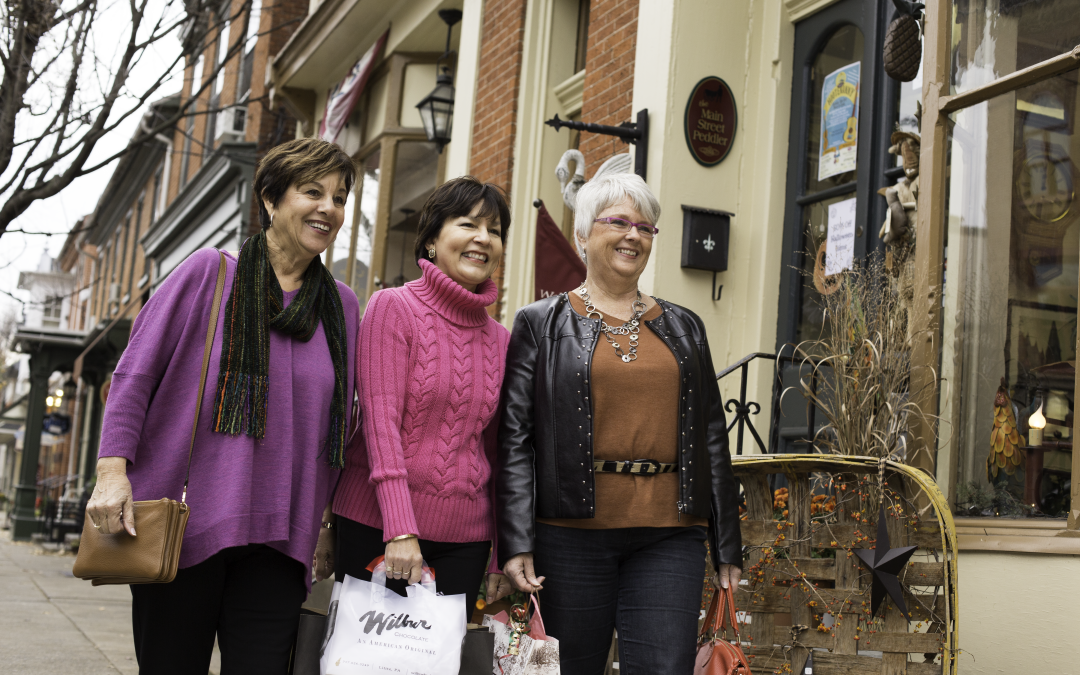 Three ladies shopping downtown Lititz, PA.